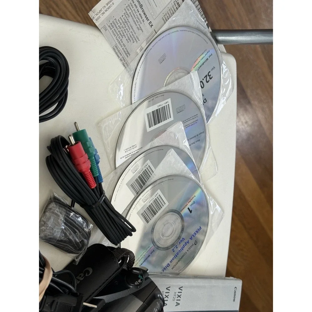 Canon VIXIA HF200 Camcorder Video Camera, With Cords/manual , (not Working)